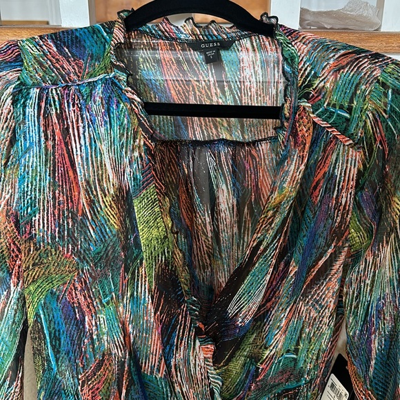 Multi colored sheer peplum long sleeve top. - Picture 3 of 5